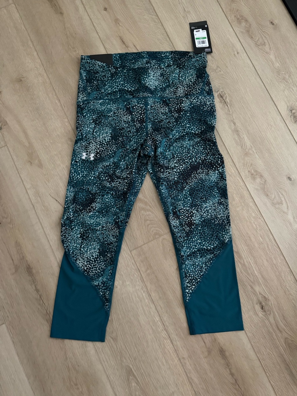 Teal and black capri leggings